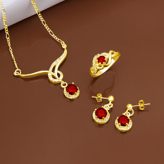 Arany Bevonatú Szett Vörös Emporia® Kristállyal (Nyaklánc+Fülbevaló+Gyűrű)