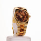 Arany színű női óra tigris csíkokkal és római számos számlappal - Ékszer TV